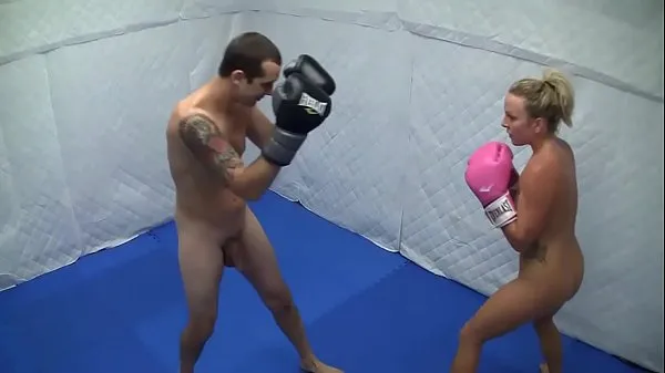 Oglejte si Dre Hazel defeats guy in competitive nude boxing match tople posnetke